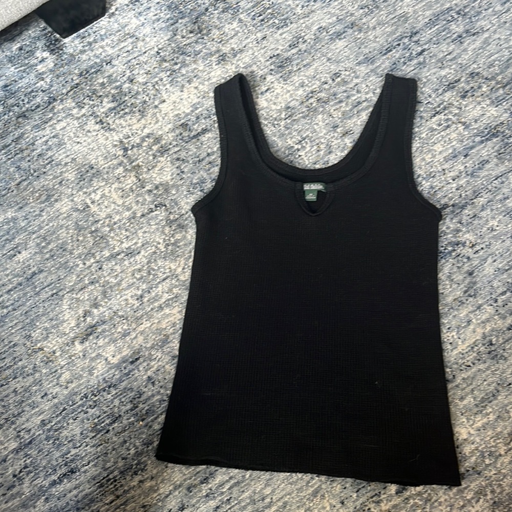 black tank with slit in the middle top area